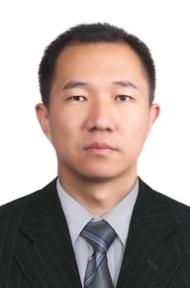 A person in a suitDescription automatically generated with medium confidence